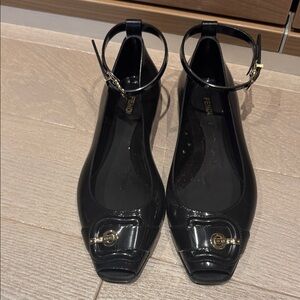 Fendi Black flats with Gold Accents